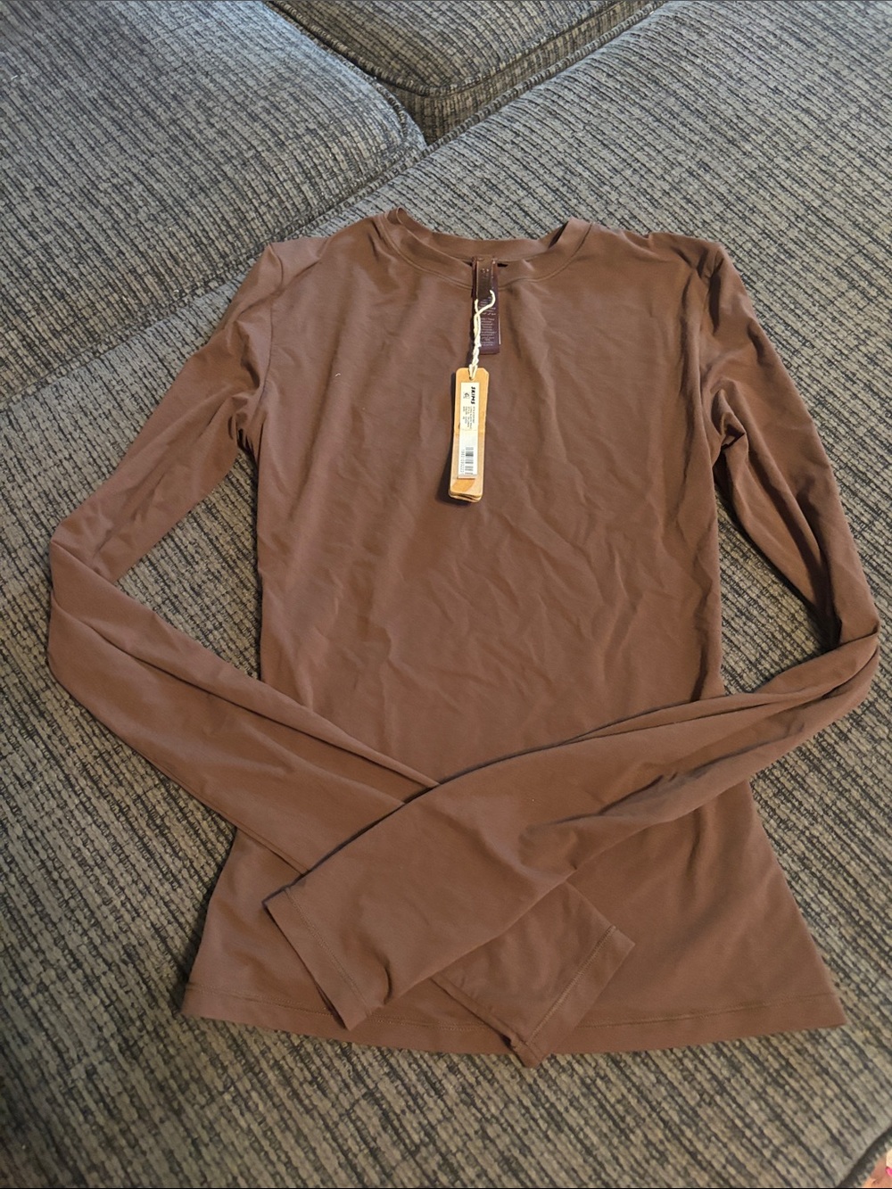 Skims fits everybody long sleeve Tshirt $58 value
Color cocoa